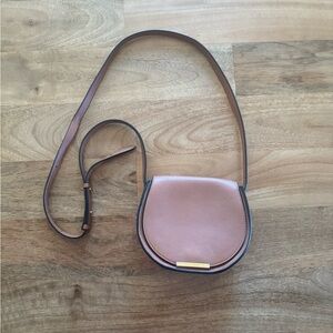 Cuyana mini saddle bag in caramel leather